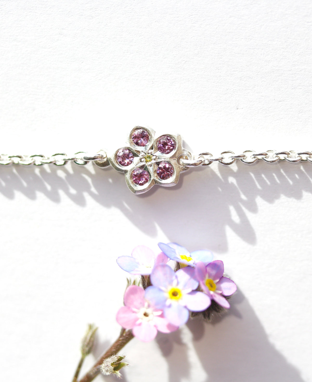 Pink sapphire and yellow diamond forget me not bracelet