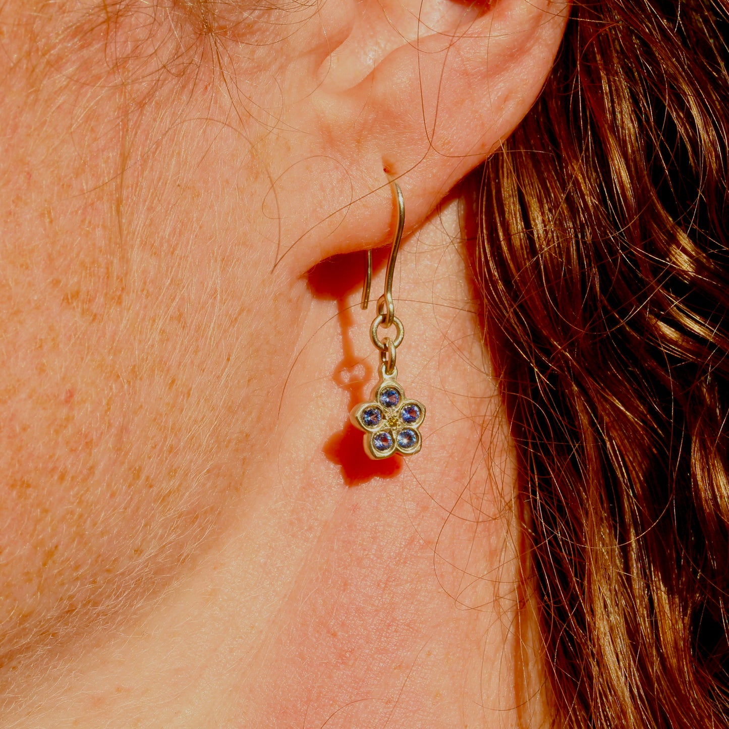 White gold sapphire forget me not earrings