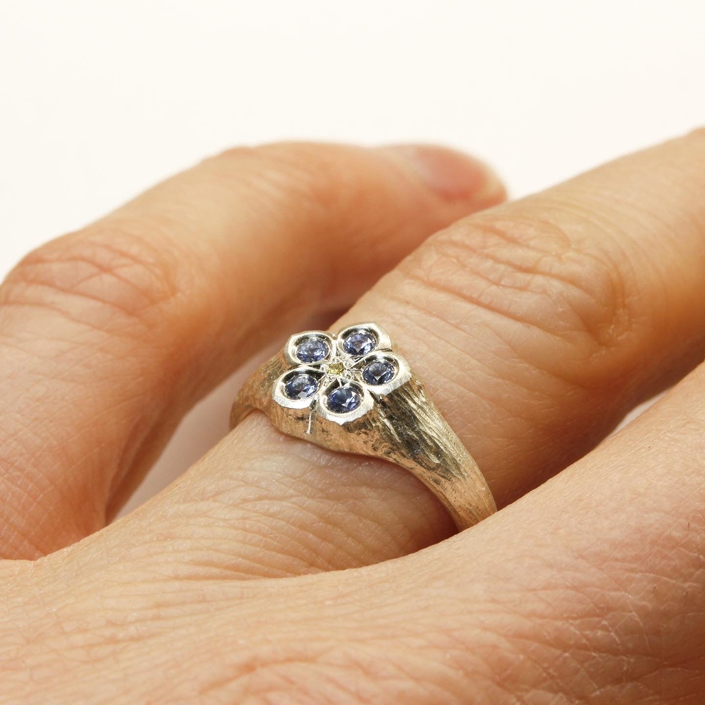 Sapphire and yellow diamond forget me not ring