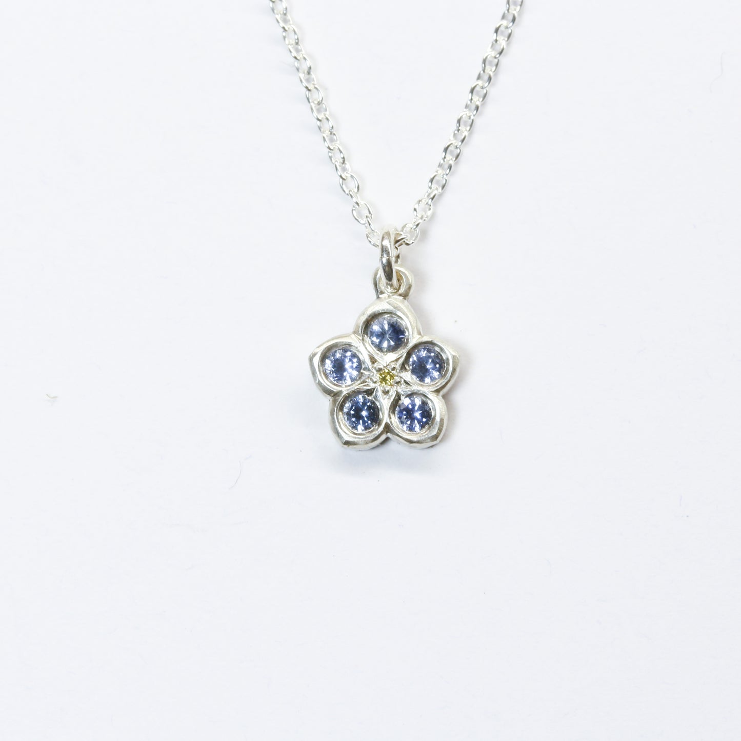 Forget me not sapphire and yellow diamond pendant
