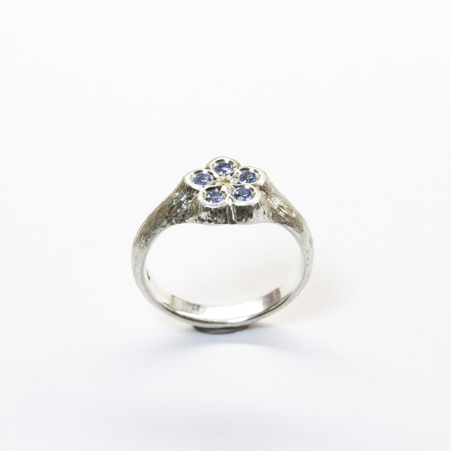 Sapphire and yellow diamond forget me not ring