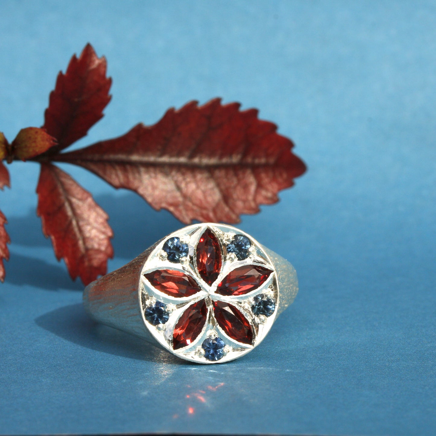 Kāmahi kaleidoscope ring