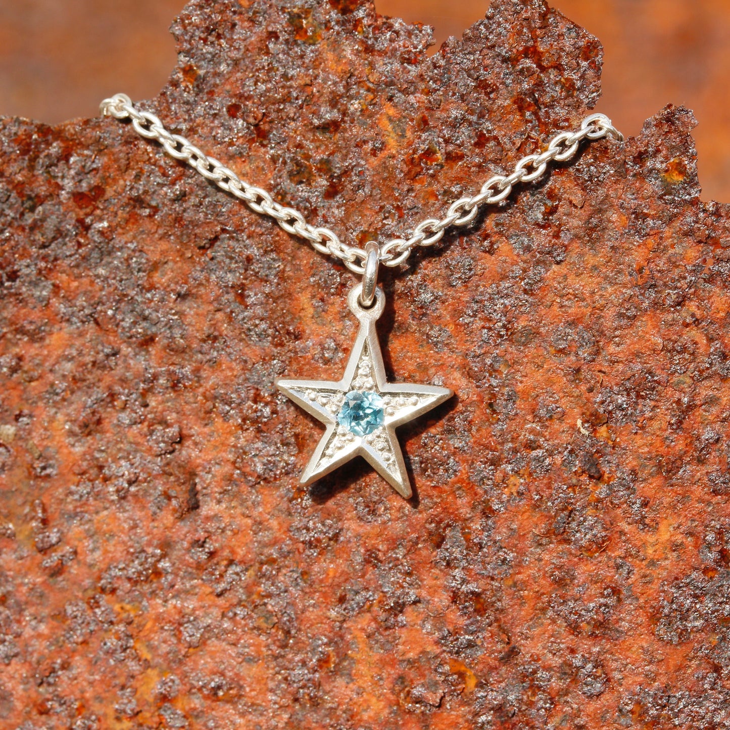 Topaz star pendant