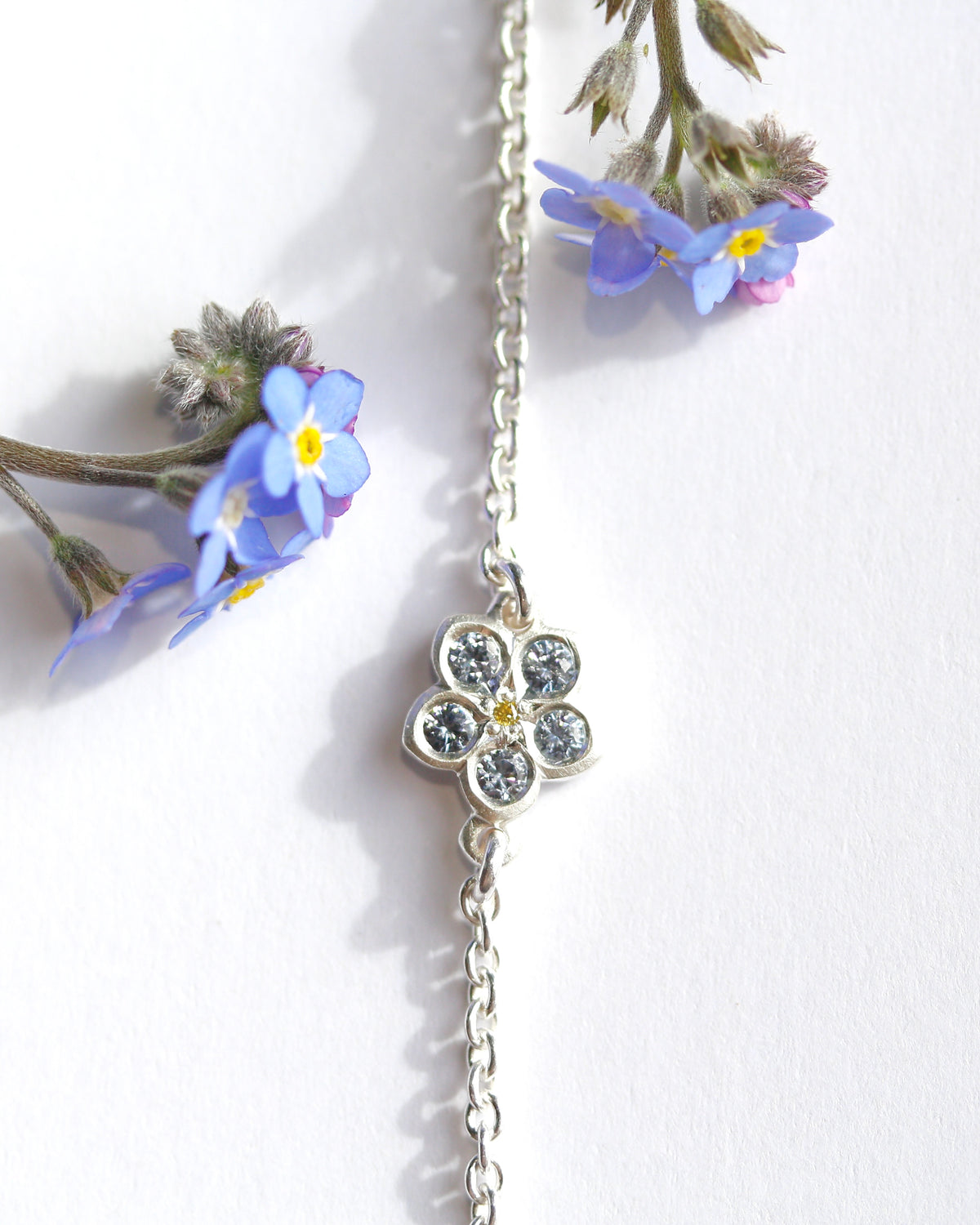 Sapphire and yellow diamond forget me not bracelet