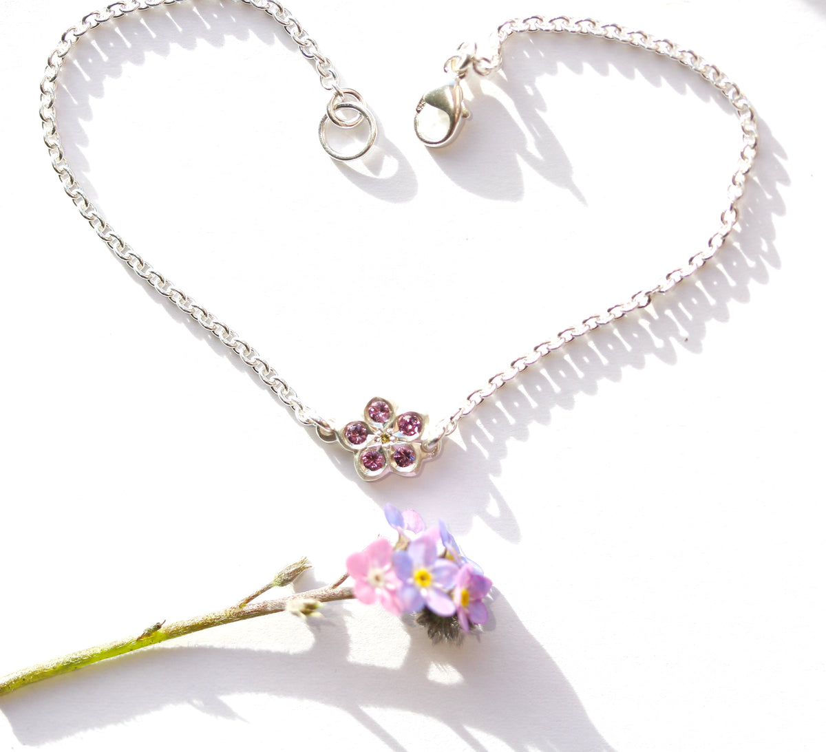Pink sapphire and yellow diamond forget me not bracelet