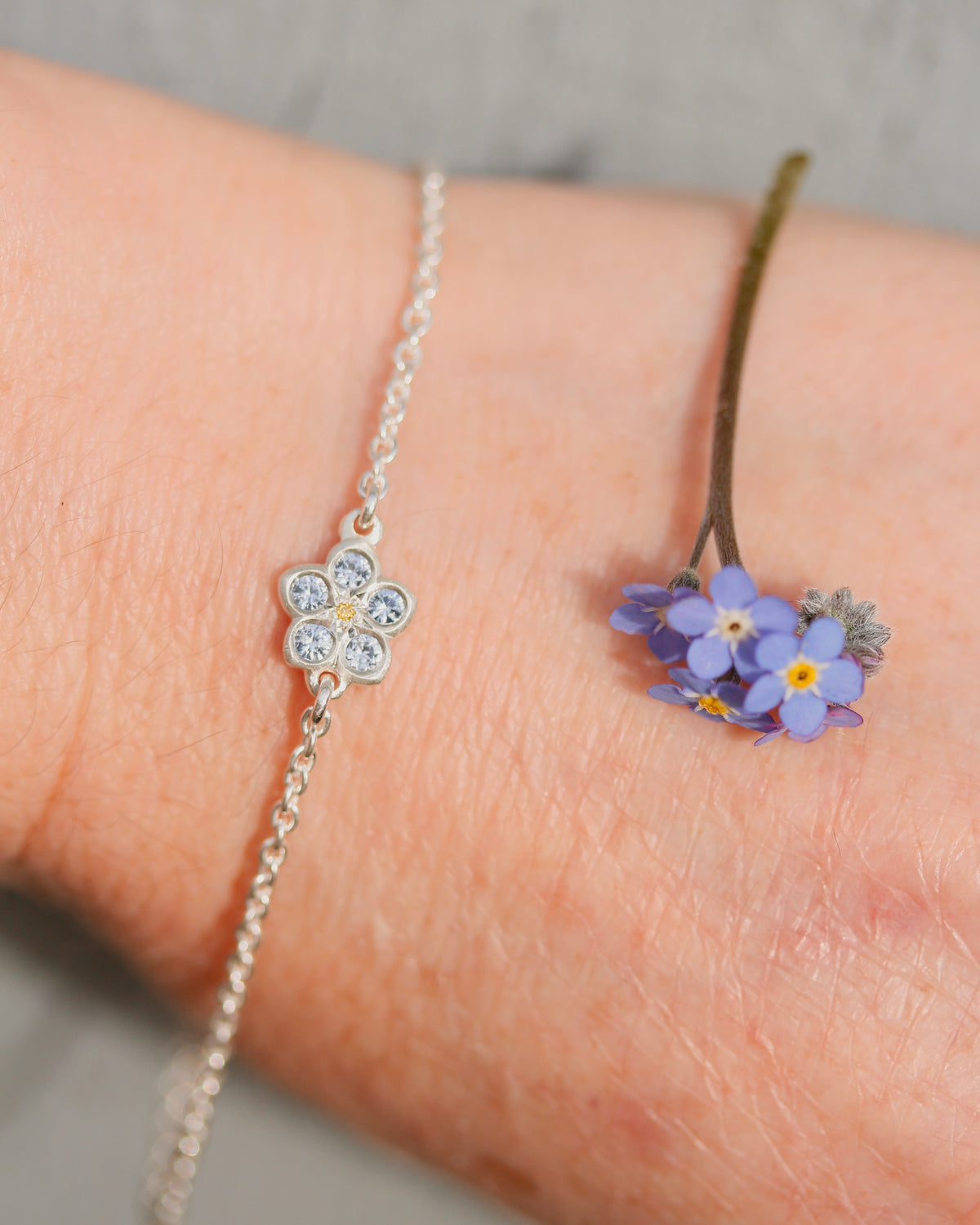Sapphire and yellow diamond forget me not bracelet