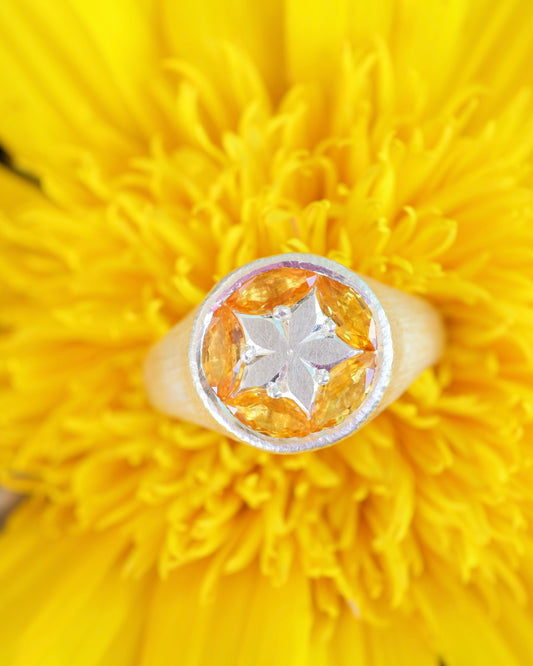 Buoyant ring in yellow sapphires