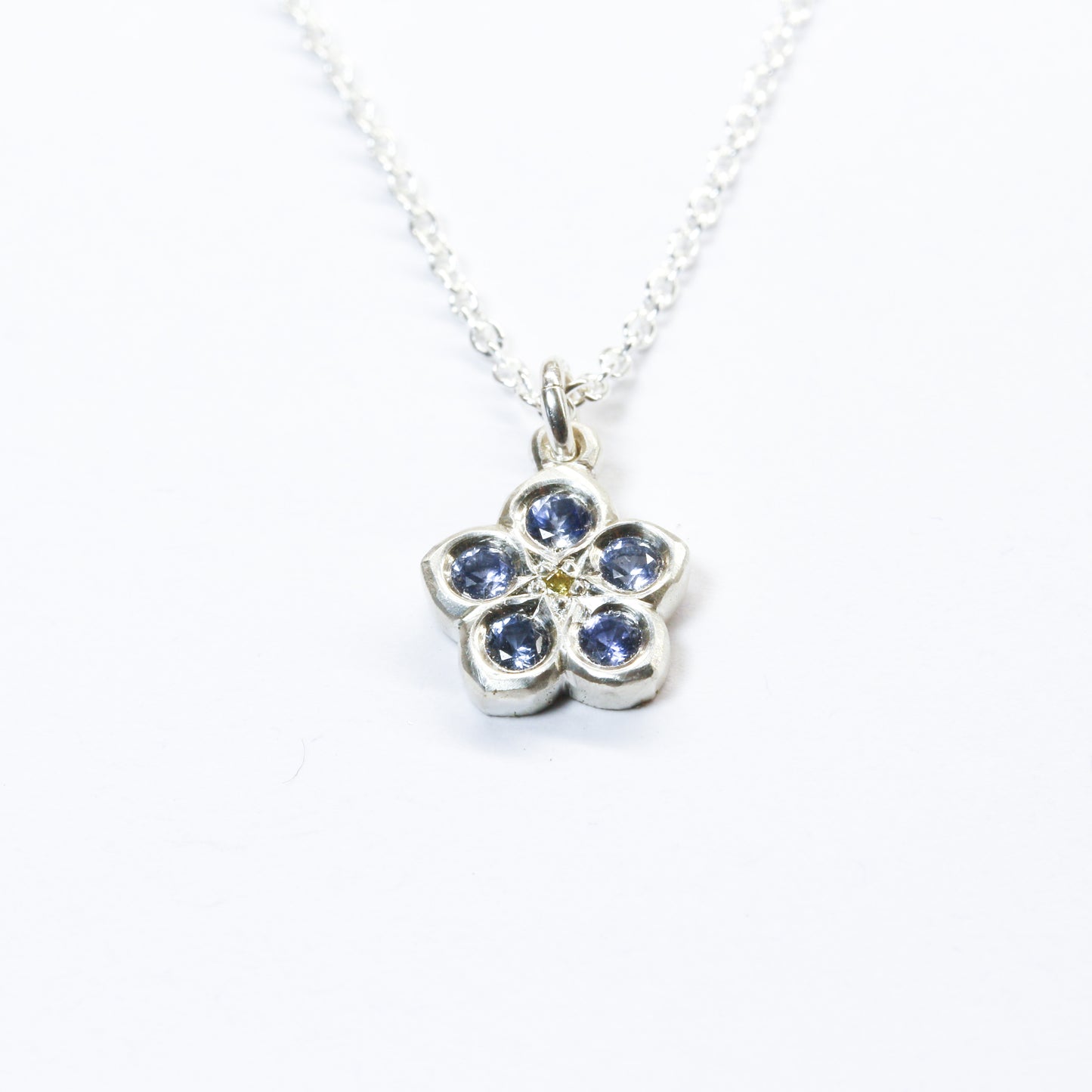 Forget me not sapphire and yellow diamond pendant