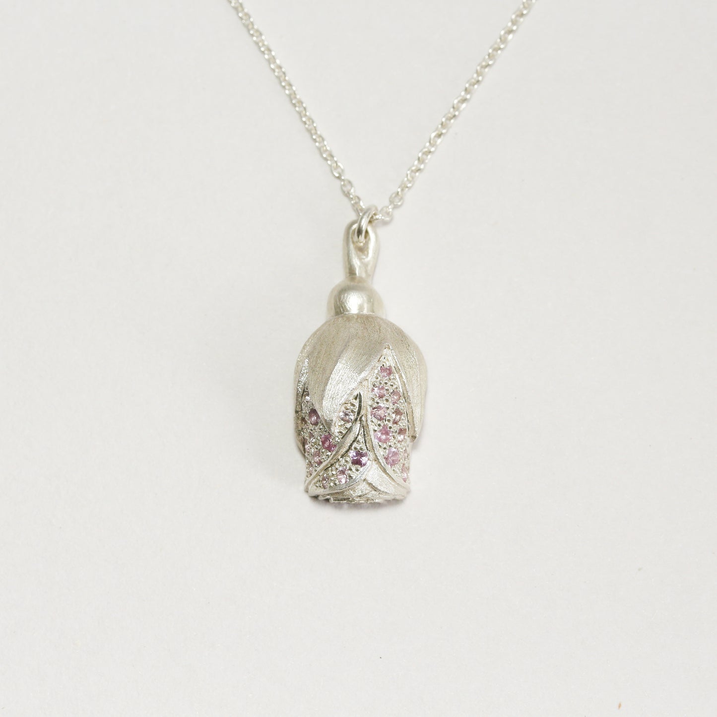 Pink sapphire rosebud pendant