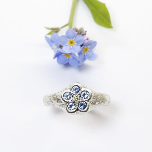 Sapphire and yellow diamond forget me not ring